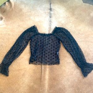 See through black polka dot shirt